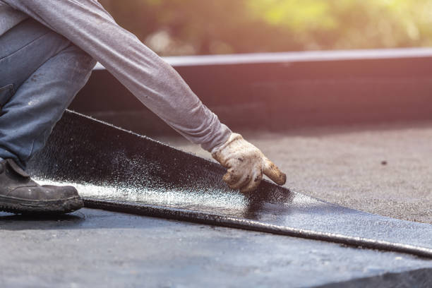 Professional Basement Waterproofing technician working in Belding, MI